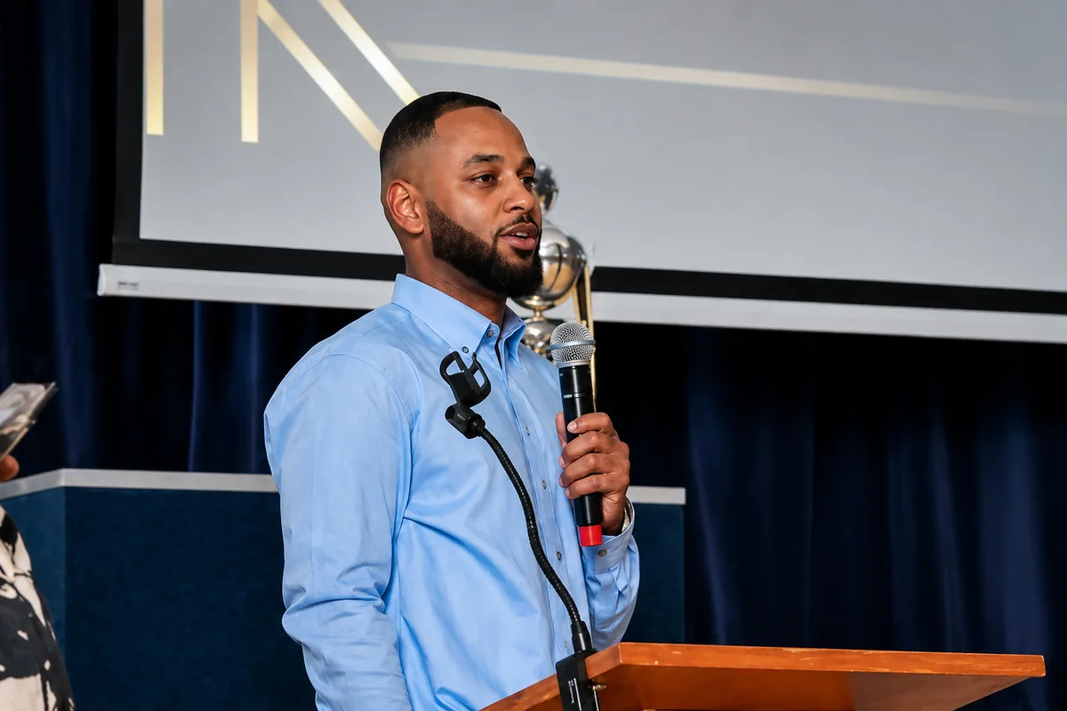 School of Skill founder Dailian Mason speaking at a youth development event
