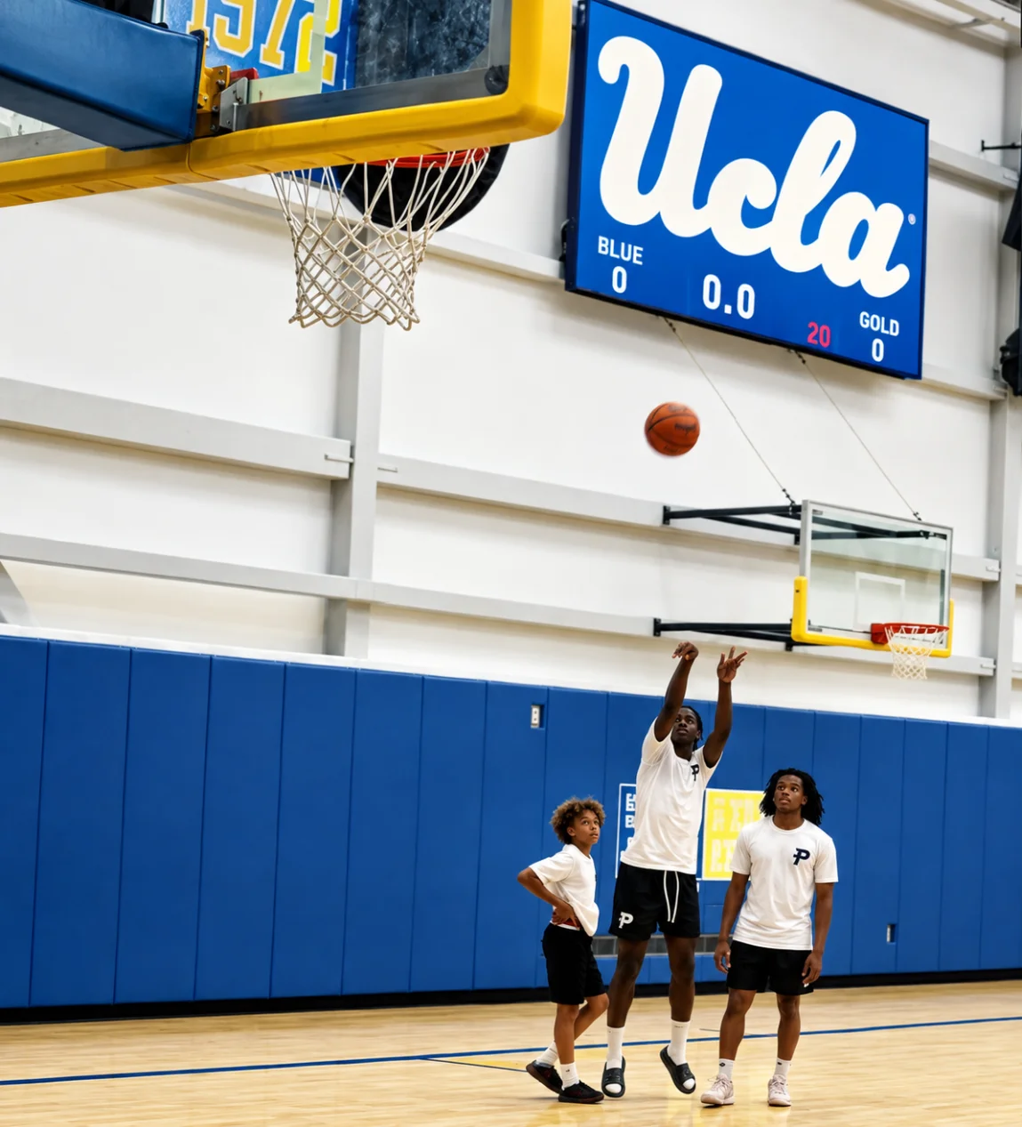 School of Skill players shooting hoops at UCLA during an international basketball experience